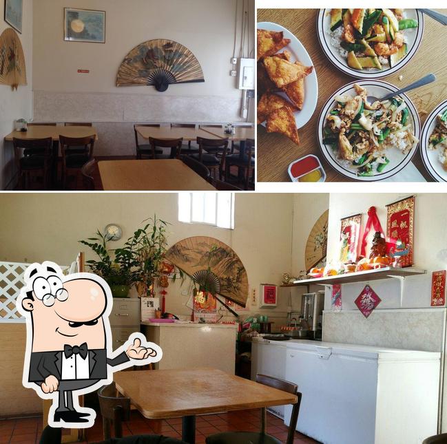 Check out the picture displaying interior and dining table at Hunan Cafe #2