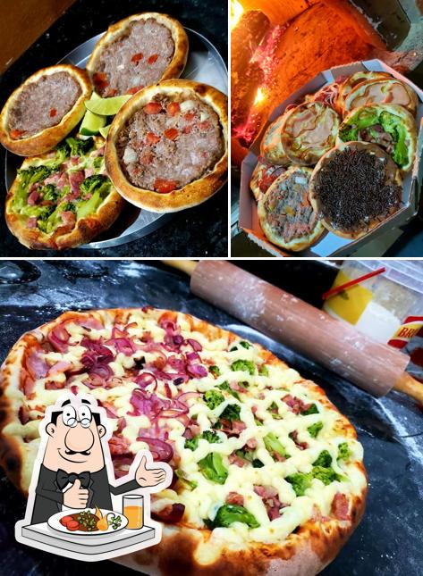 Comida em Pizzaria Forno a Lenha