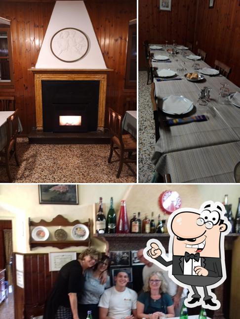 Guarda la immagine che raffigura la interni e bancone da bar di Ristorante Osteria al Ponte