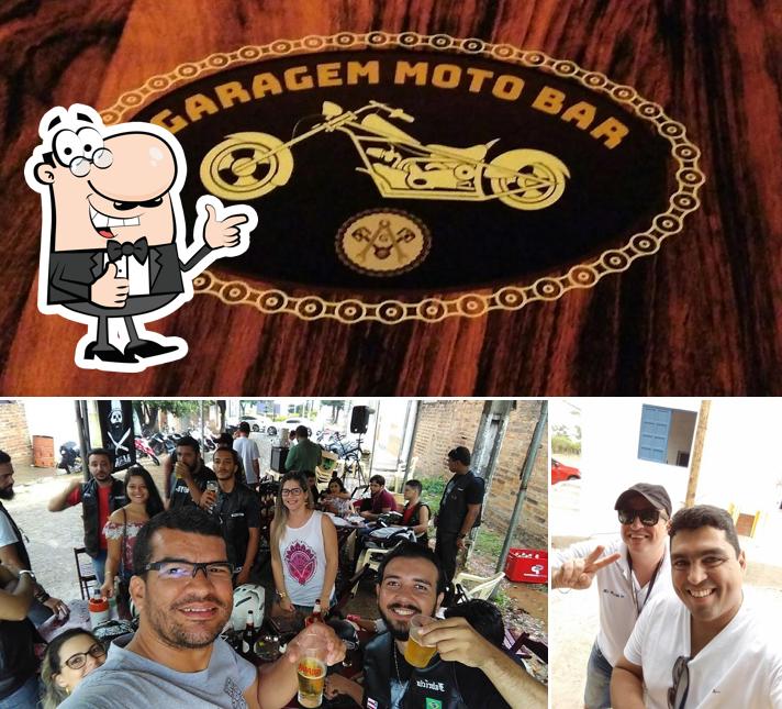 Look at the pic of Garagem Moto Bar