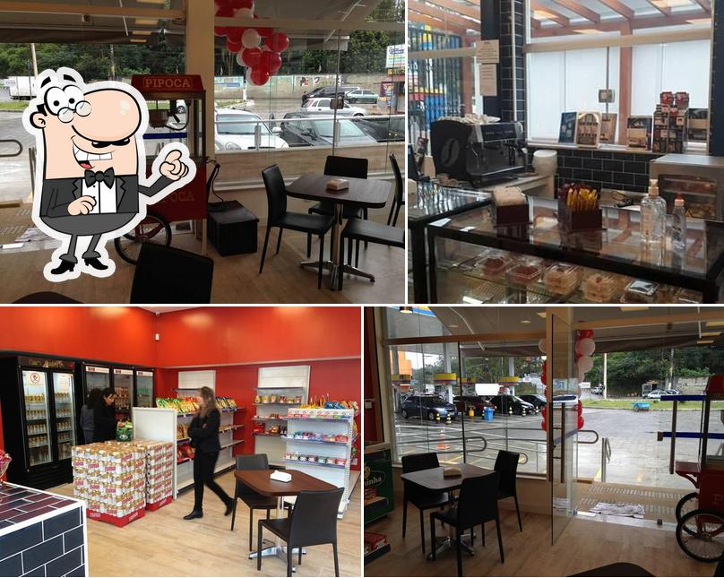 O interior do Ideal Café e Conveniência