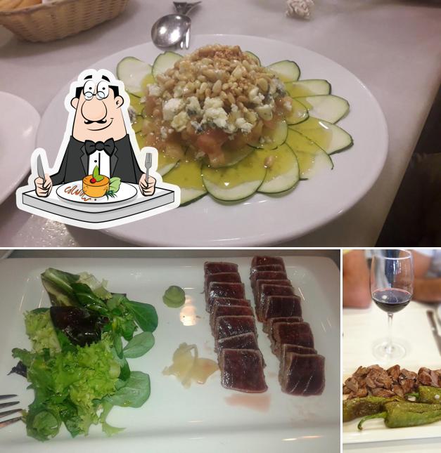 Check out the picture displaying food and wine at Restaurante El Zahir