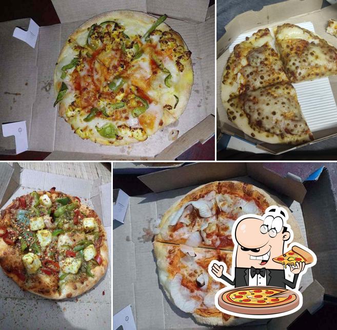 Try out pizza at Domino's Pizza