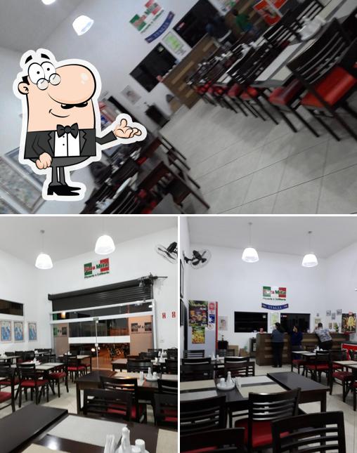 O interior do Pizza Mila