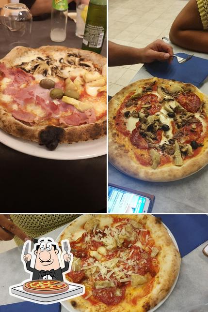 Prova una pizza a SAINT LOUIS PIZZERIA BRACERIA