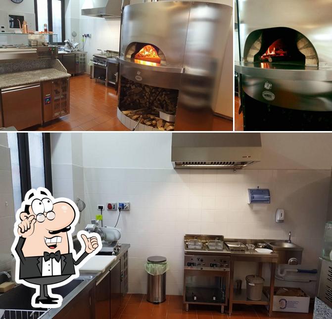 Dai un'occhiata agli interni di Pizzeria D'Asporto Il Mangione