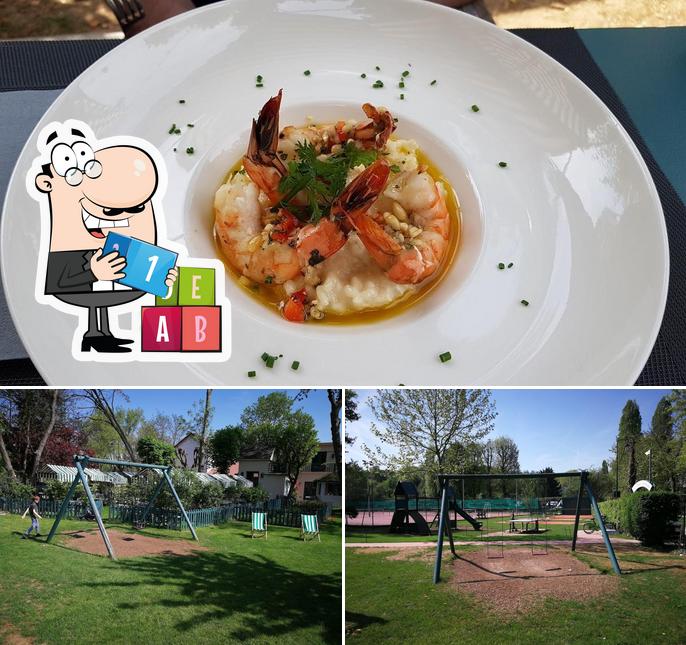Check out the picture showing play area and seafood at Le Verger du Fruit Défendu