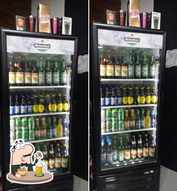 Você pode tomar um copo de cerveja leve ou escura