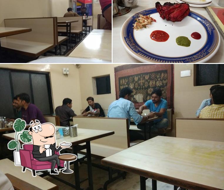 Check out the picture showing interior and food at Tavaa Restaurant
