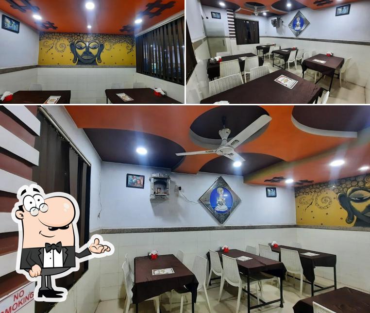 The interior of Jai Jalaram Hotel Pure Veg Kathiyawadi Restaurant Rakholi