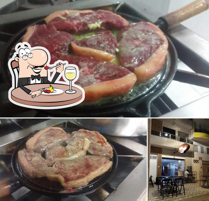 O Pizzaria Recanto do Sabor se destaca pelo comida e interior