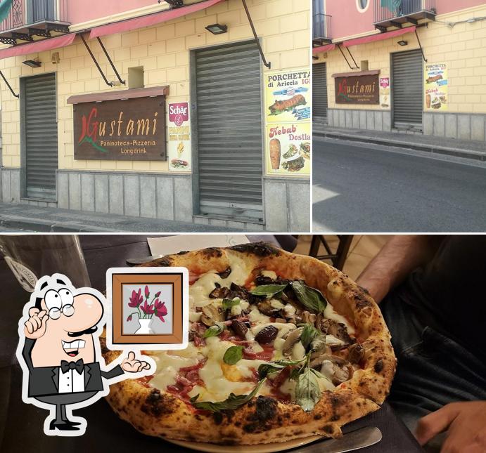 Pizzeria Gustami si caratterizza per la interni e pizza