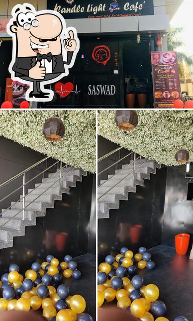 Look at this photo of Candle Light Cafe