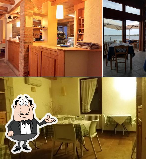 Siediti a un tavolo di Albergo Ristorante al Pescatore
