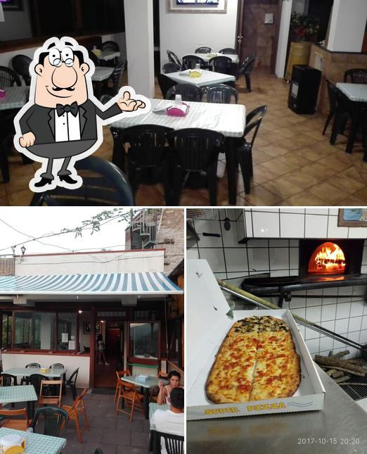 Questa è la foto che mostra la interni e pizza di Pizzeria La Sorrentina Di Vanacore Anna