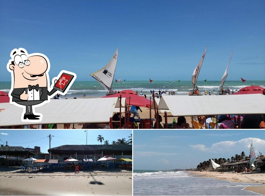 Você pode espairecer no na área externa do Barraca Brisa Do Mar ( O Mirtil)