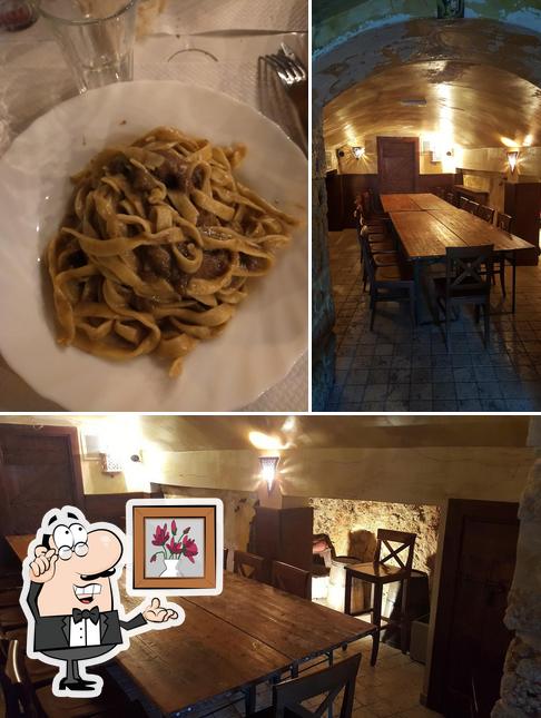 Questa è la foto che mostra la interni e dolce di Taverna LA CAUTA