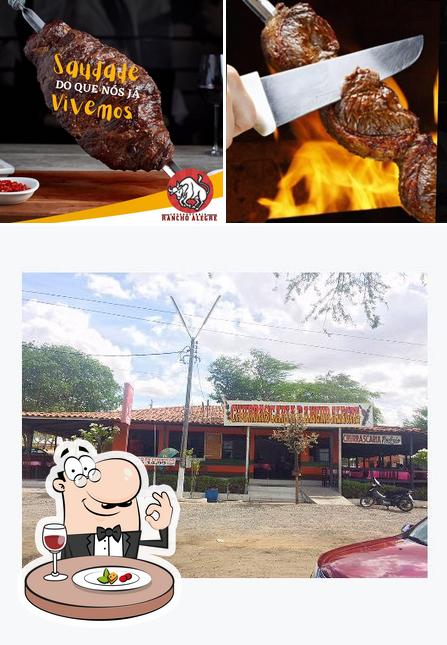 A imagem da comida e exterior no Churrascaria Rancho Alegre