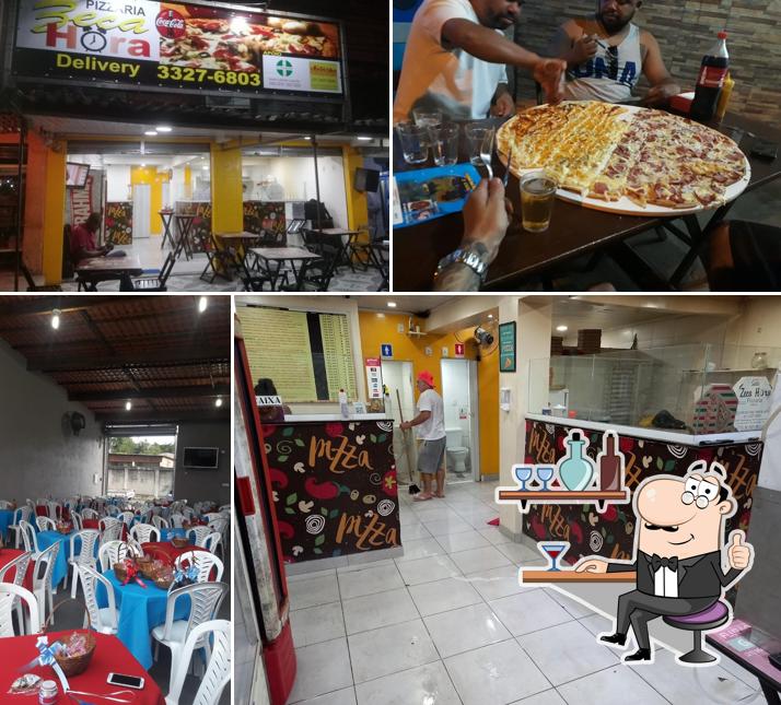 O interior do Pizzaria Zeca Hora Original