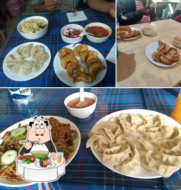 Take a look at the photo displaying dining table and food at Dicky Tibet Restaurant