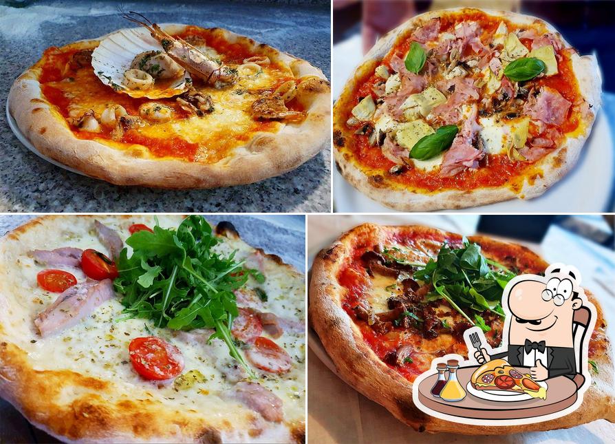 Essayez des pizzas à Osteria Il Pescatore