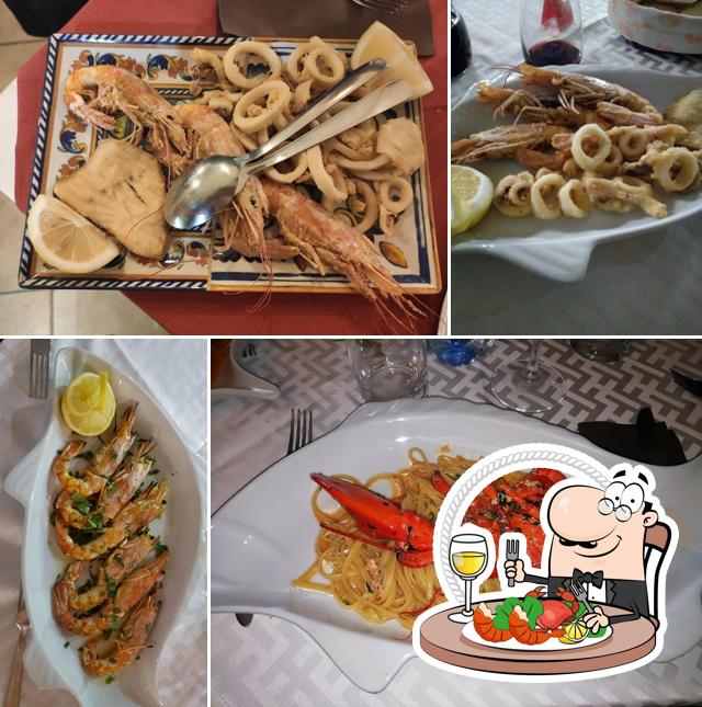 I clienti di Ristorante Pizzeria America possono godersi vari prodotti di cucina di mare