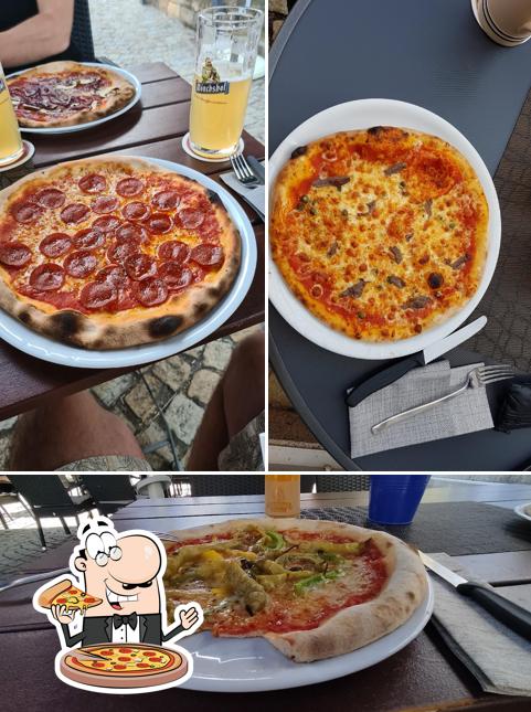 Try out pizza at Ristorante Pizzeria Da Rocco