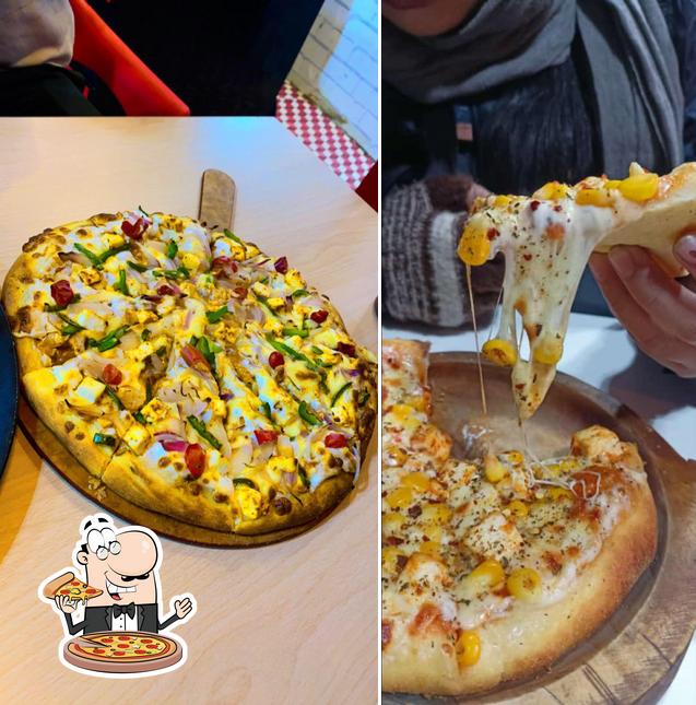 Get pizza at PIZZA COFFEE DAY