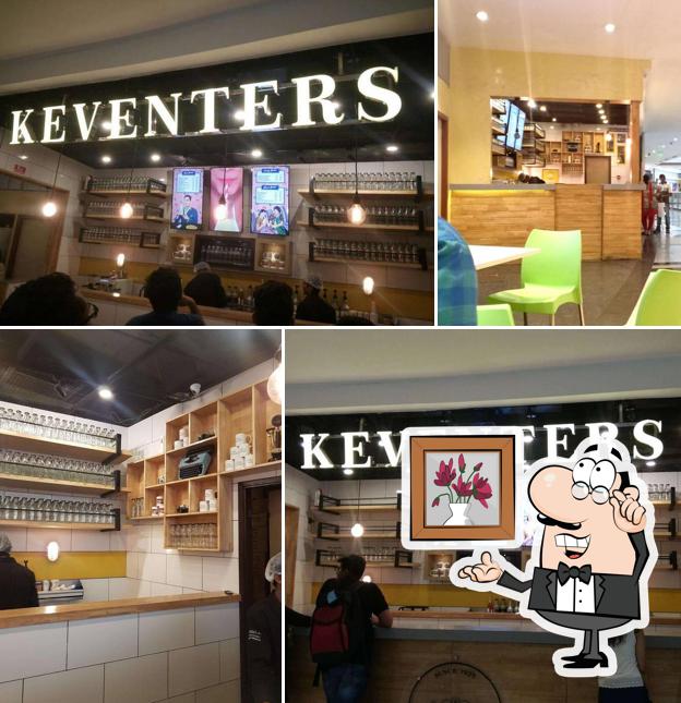 Take a seat at one of the tables at Keventers - Milkshakes & Desserts