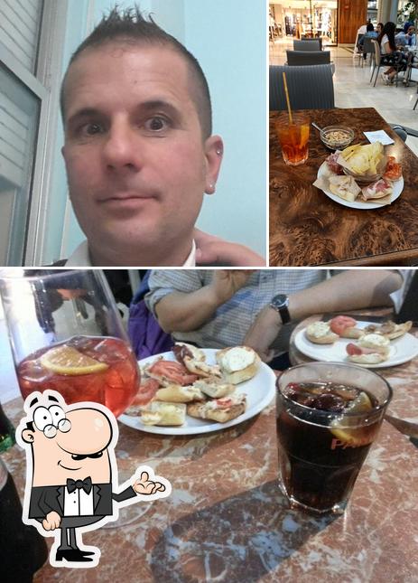 La foto della interni e tavolo da pranzo di Cocktail Bar