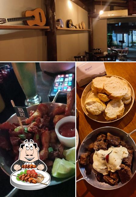 A ilustração do MADUREIRA BAR MÚSICA GASTRONOMIA’s comida e interior