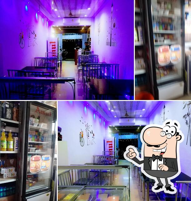 Take a seat at one of the tables at Amul Parlour Palakkad