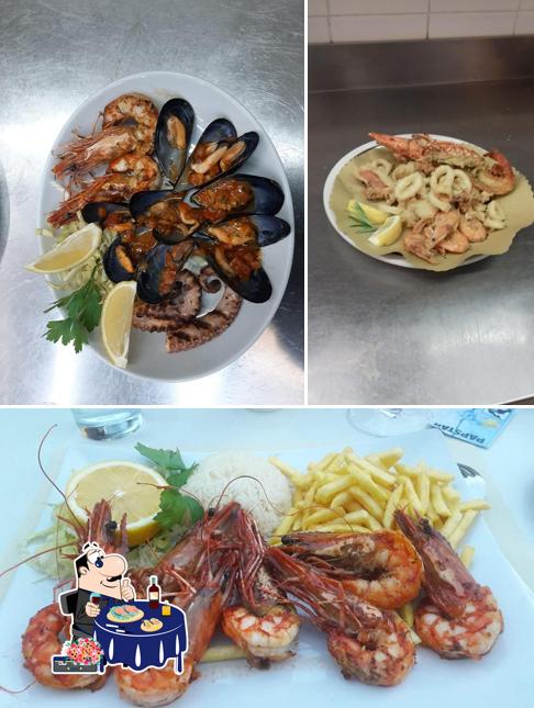 Prenditi la cucina di mare a Ristorante Grotto Cercera