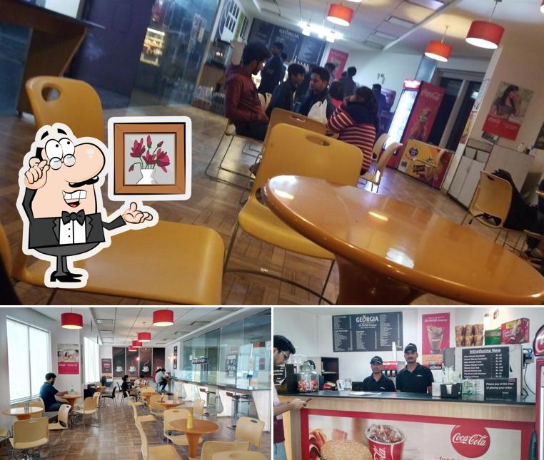 Take a seat at one of the tables at Nescafe
