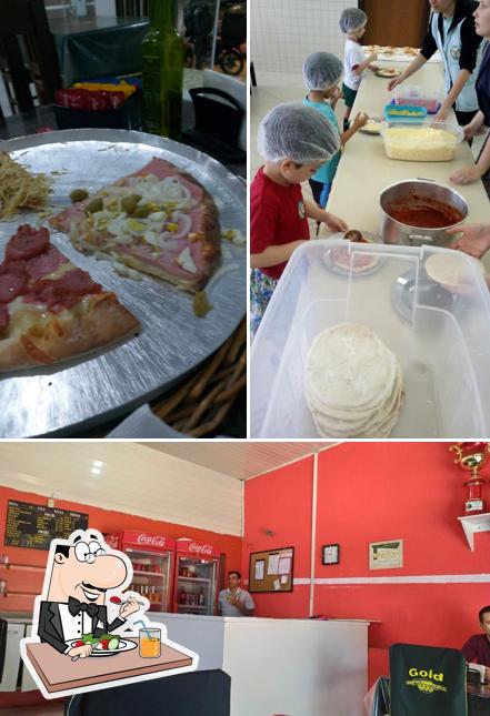 A foto do Gold Pizzas’s comida e interior