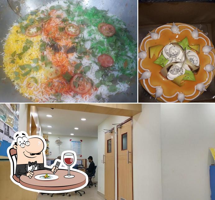Check out the picture depicting food and interior at Prasad sweets with restaurant