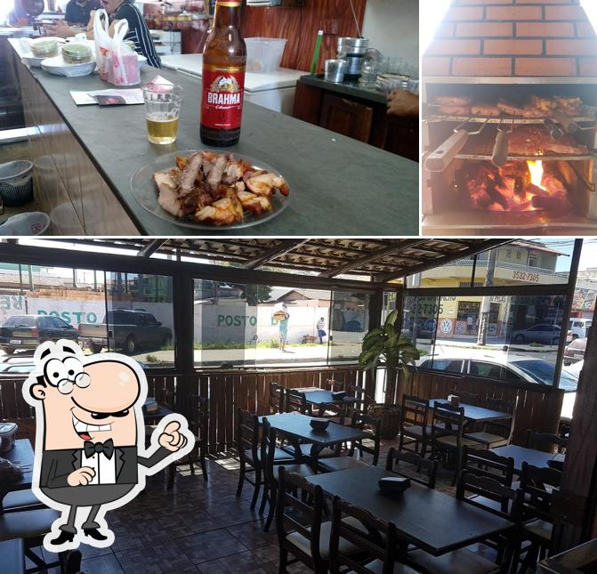 Dê uma olhada a imagem apresentando interior e cerveja no Ponto Do Tropeiro Bar E Restaurante