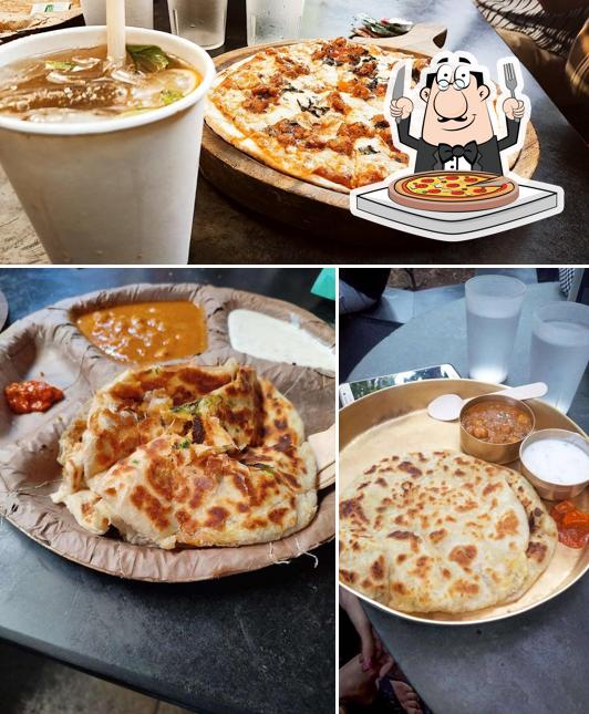 Get pizza at Prithvi Cafe