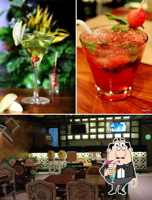 This is the image showing drink and interior at The Coconut Tree By Coconut Grove