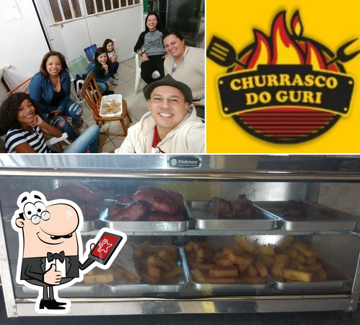 Look at the photo of CHURRASCO DO GURI