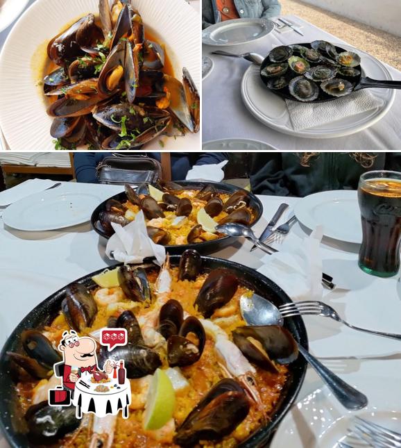 Order different seafood dishes available at Restaurante La Marisma