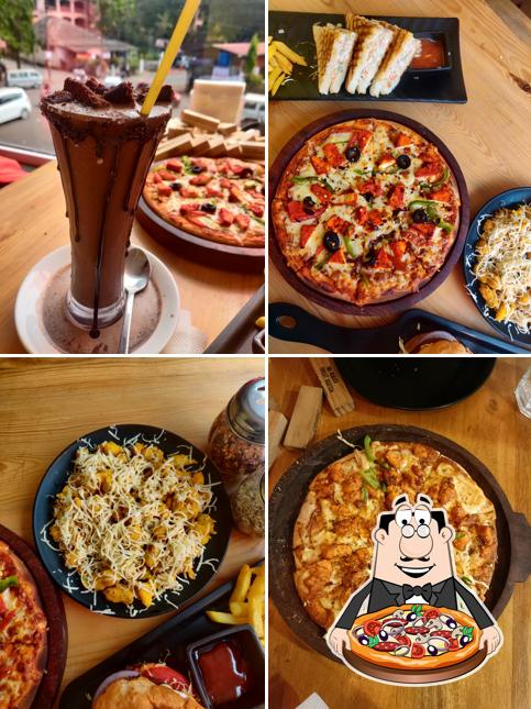 Try out pizza at The Banyan Cafe Restaurant and Bar