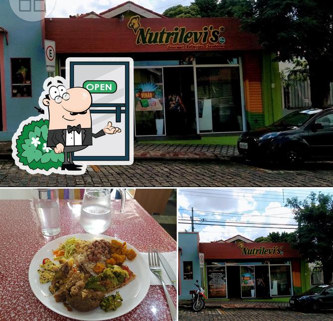 A imagem da exterior e comida no Restaurante Nutrilevi's Gourmet