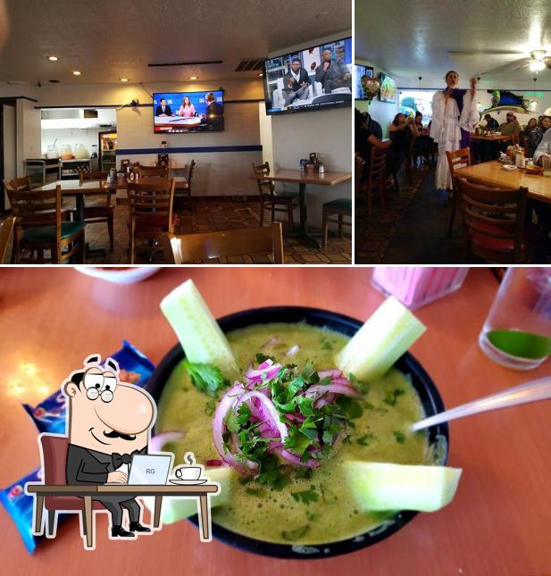 Take a look at the picture showing interior and food at Delicias Del Mar