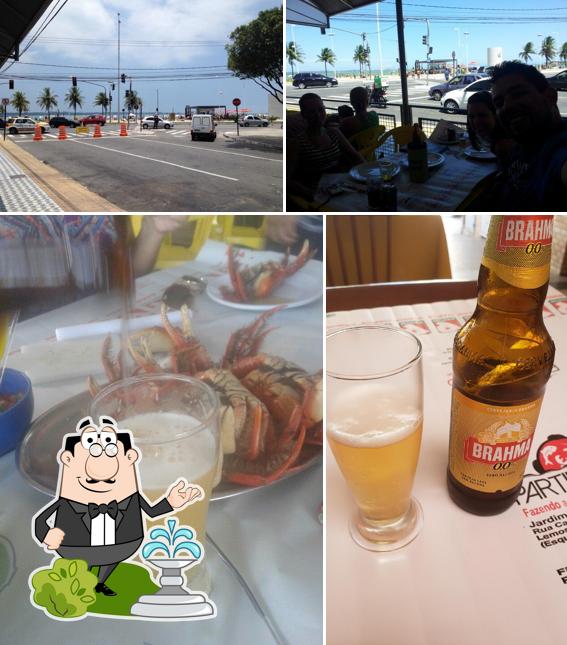 Entre diversos coisas, exterior e bebida podem ser encontrados no Restaurante Partido Alto