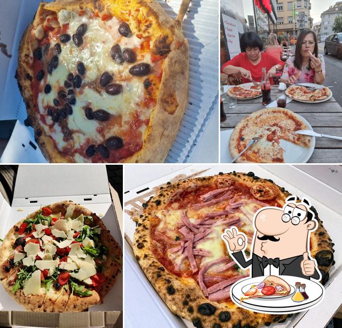 A Napulé, puoi assaggiare una bella pizza