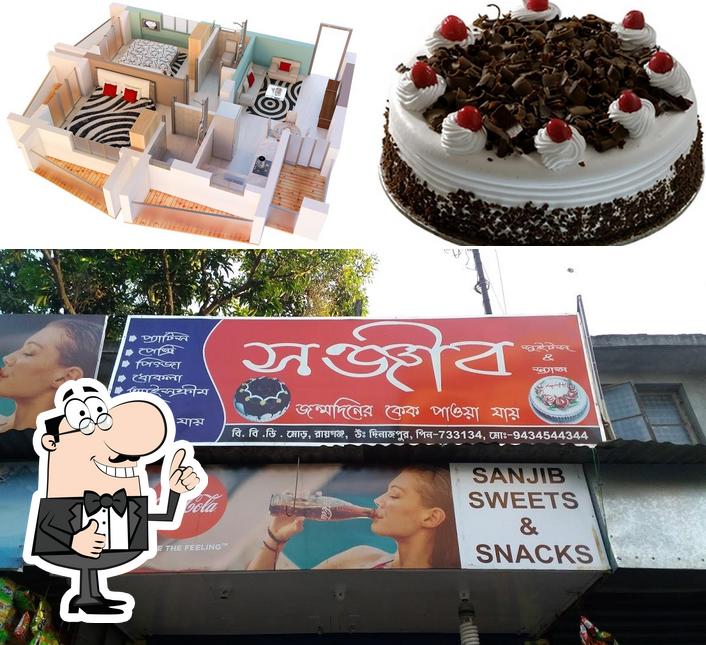 Look at this image of SANJIB SWEET'S & SNACKS