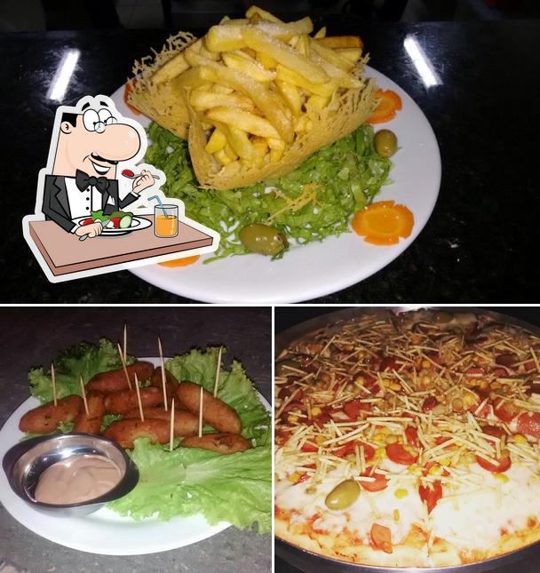 Comida em Pizzaria Caminetto