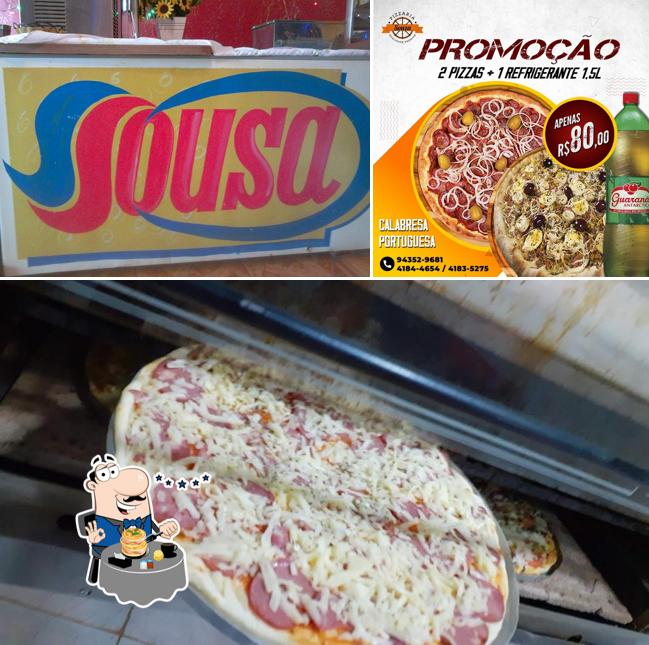 Comida em pizzaria sousa