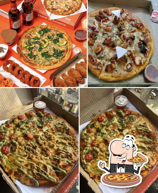Get pizza at Gusteaus Pizza